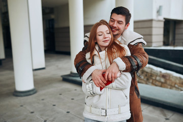 beautiful ginger girl with closed eyes enjoying the love. unforgettable moments, support, love forever.pounding heart, hugs and kisses.warm autumn, fall.close up photo. copy space.