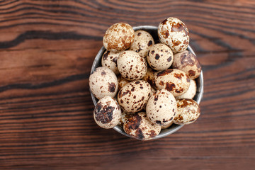 quail eggs on wooden background