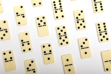 Photo of different dominoes. Background of dominoes. Hobbies collecting on white background.