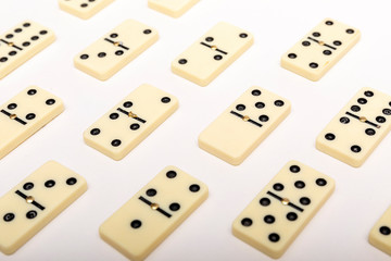 Photo of different dominoes. Background of dominoes. Hobbies collecting on white background.