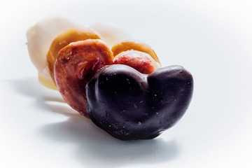Sweet chocolate, white chocolate, strawberry and sugar candies
