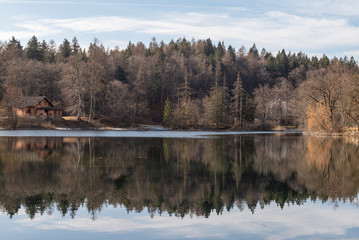 Fototapeta premium Cei lake in Trentino winter season, peaceful