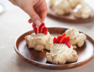 Pavlova dessert, the meringue with strawberries