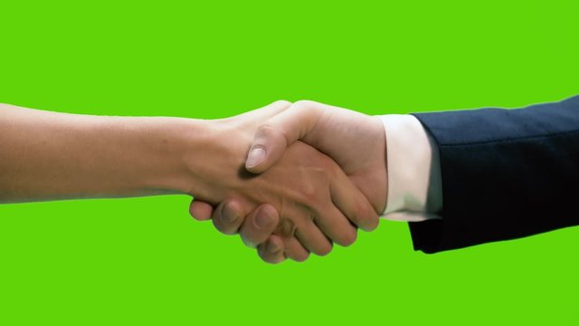 Two business partners shaking hands against green screen background, Chroma key, 4k pre-keyed footage