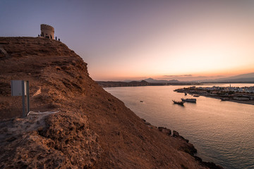 Beautiful sunset of Sur's bay from Al Ayjah castle, Oman