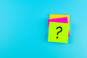 Questions Mark ( ? ) word in paper note on blue background. FAQ( frequency asked questions), Answer, Q&A, Communication and Brainstorming, International Ask a Question day Concepts
