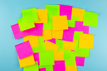 Empty paper note on blue background with copy space for text. FAQ( frequency asked questions),...