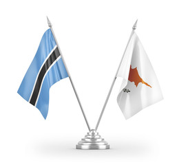 Cyprus and Botswana table flags isolated on white 3D rendering