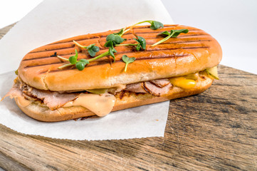 Panini with ham, cheese and soybean seedlings