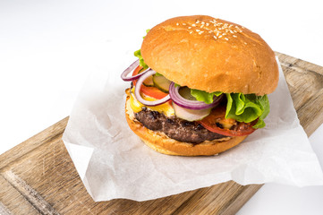 Craft beef burgers with vegetables. Copy space for your text
