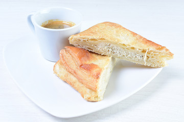 Cup of hot coffee white wooden background
