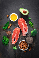 Omega-3 fats. Salmon fish and vegetarian sources of unsaturated fatty acids. Healthy food concept for good health. Top view