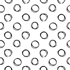 An abstract seamless pattern consisting of circles drawn by hand. Circles drawn in the style of a sketch by pen. Vector eps illustration.