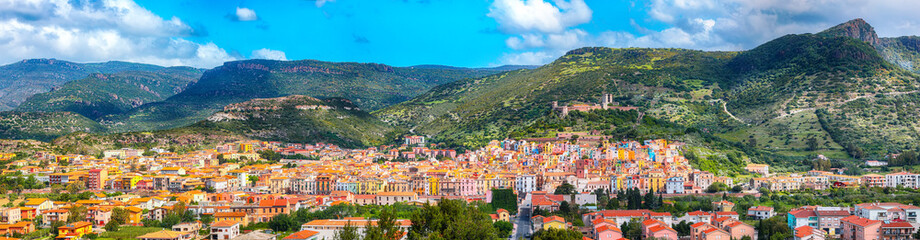 Fototapeta na wymiar Wonderful morning panorama of colourful houses of old town Bosa in Sardinia