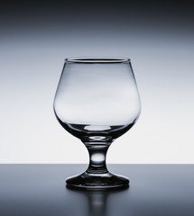 empty glass isolated on black background