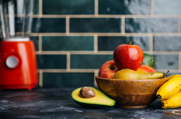 Fruits and vegetables on the kitchen table for fruit smoothies, juices and drinks. Cooking healthy...