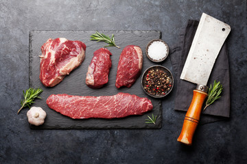 Variety of raw beef steaks