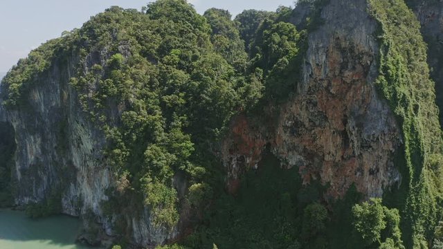 Krabi Thailand Aerial v26 Flying low backwards away from Railey East cliffside viewpoint - January 2020