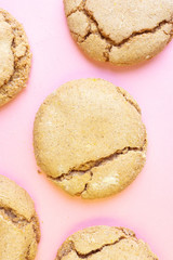 Round homemade cookies close-up. Baking cooking concept. Close-up, top view. Pink background.