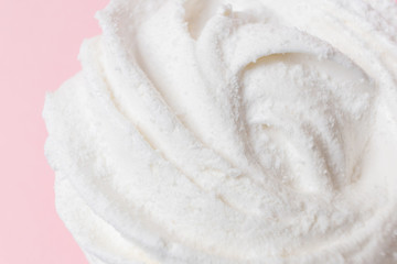 Fresh vanilla marshmallows closeup. Detailed macro photo. The concept of home cooking, sweets. Minimalism, copyspace.