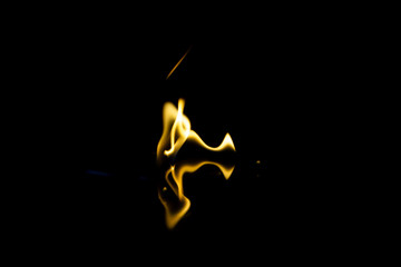 blank postcard dance of fire on a black background with a reflection