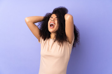 Young african american woman isolated on purple background stressed overwhelmed