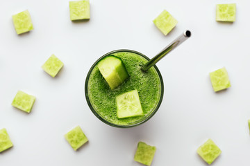 Cucumber vegan smoothie in many glasses, nutrient hydrating green juice, detox food, weight loss...