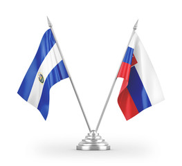 Slovakia and El Salvador table flags isolated on white 3D rendering - obrazy, fototapety, plakaty