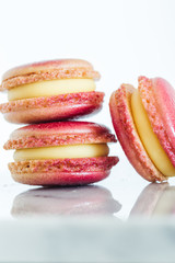Assorted macarons on marble background