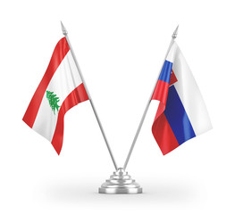 Slovakia and Lebanon table flags isolated on white 3D rendering
