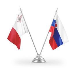 Slovakia and Malta table flags isolated on white 3D rendering