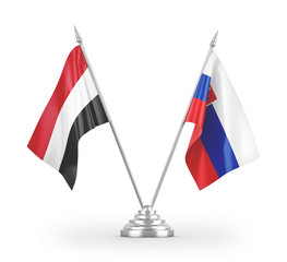 Slovakia and Yemen table flags isolated on white 3D rendering