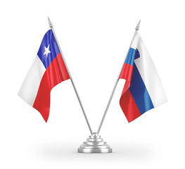 Slovenia and Chile table flags isolated on white 3D rendering