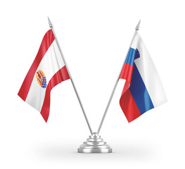 Slovenia and French Polynesia table flags isolated on white 3D rendering