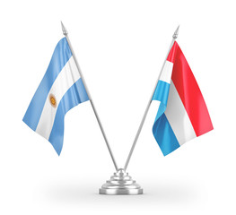 Luxembourg and Argentina table flags isolated on white 3D rendering