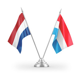 Luxembourg and Netherlands table flags isolated on white 3D rendering