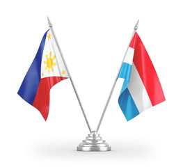 Luxembourg and Philippines table flags isolated on white 3D rendering