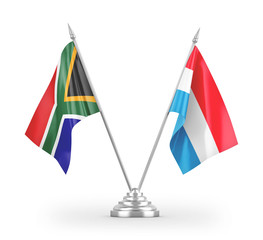 Luxembourg and South Africa table flags isolated on white 3D rendering