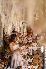 Happy young woman in street market stock photo