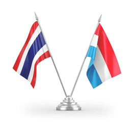 Luxembourg and Thailand table flags isolated on white 3D rendering