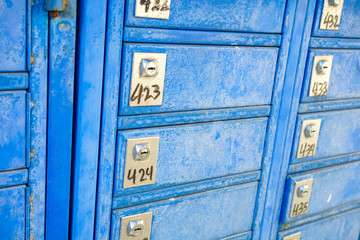 Blue mailboxes, metal street boxes
