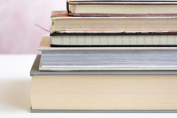Stack of books tied with a bow