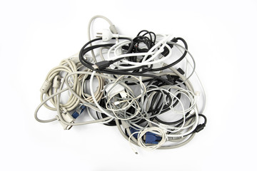 Tangled roll of computer wires on a white background