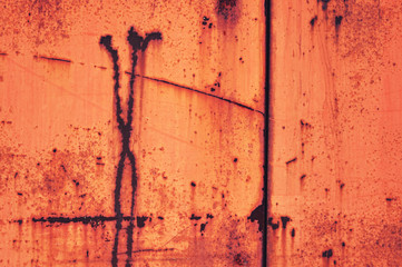 Old iron background painted in brown and blue with rust and chips.