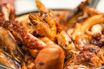 close up fried prawns and octopus tentacle