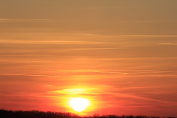 Fototapeta premium Kansas colorful Sunset with clouds and Sky out in the country.
