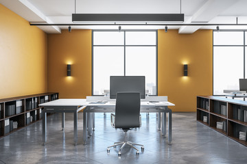 Fototapeta na wymiar Computer in yellow office interior