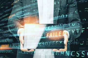 Businessman holding tablet with hacking and cyber attack interface