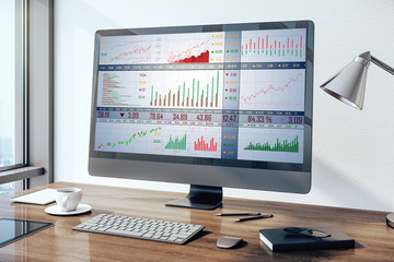 Top view computer monitor with stock chart