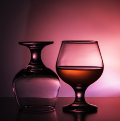 two glasses on a colorful background